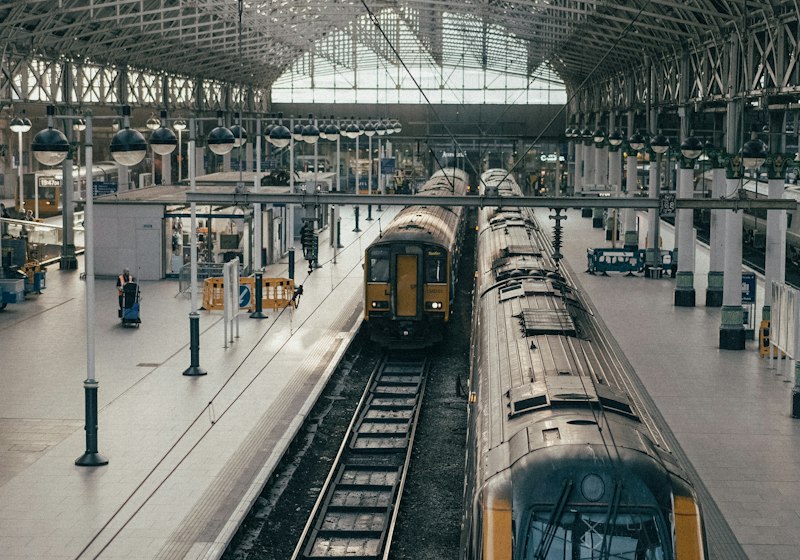 Modern passenger trains at a railway station